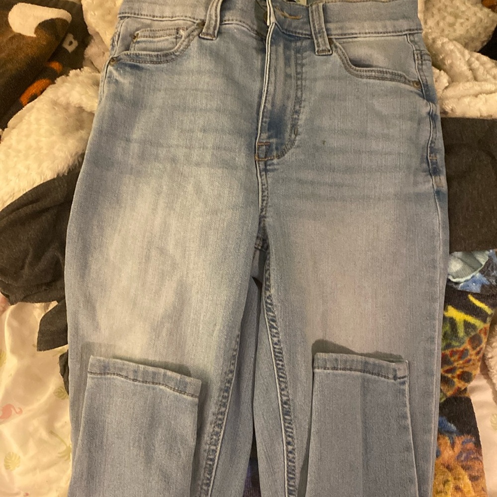 Light blue Jeans.